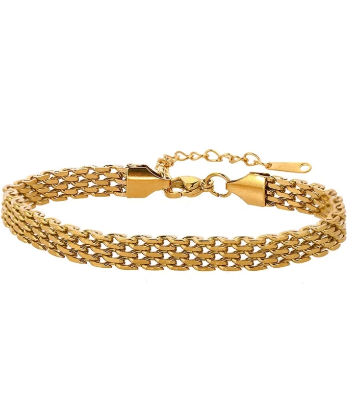 Gold and silver stainless steel chain braided bracelet flat lay on white