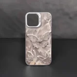 Laser 3D Butterfly PC Phone Case for Women standing upright showing light reflections.