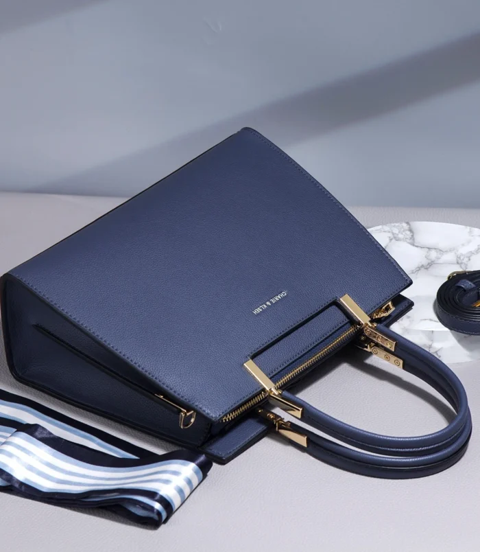 Multicolor PU leather Boston bag top down view showing the secure zipper closure.