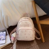 Pastel Cat Print PU Leather Backpack for Women dark pink style side angle.