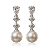Elegant silver-plated zircon pearl drop earrings displayed on a clean white background.