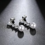 Silver-Plated Zircon Pearl Drop Earrings for Women showing the secure push-back stud closure.