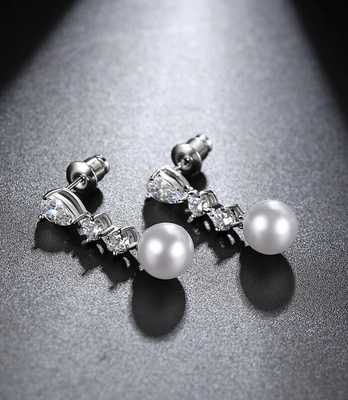 Silver-Plated Zircon Pearl Drop Earrings for Women showing the secure push-back stud closure.