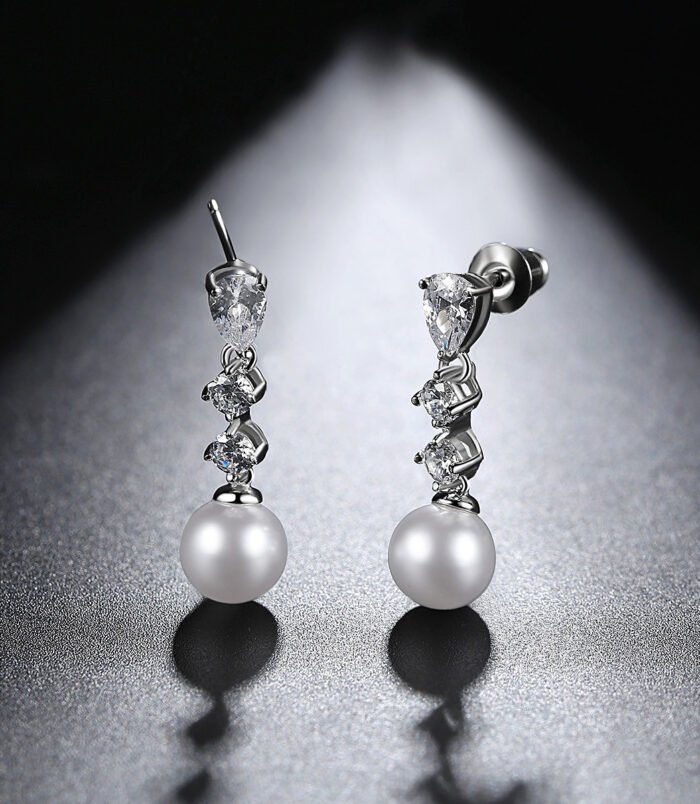 Silver-Plated Zircon Pearl Drop Earrings for Women displaying exact dimensions of length and width.