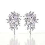 Silver zircon earrings for women featuring geometric clear stones.