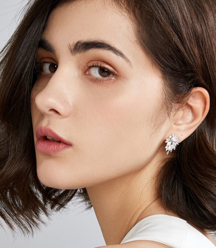 silver-zircon-earrings-women-3 Silver zircon earrings for women displayed frontally against a black background