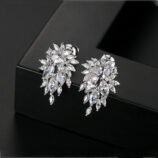 Silver zircon earrings for women displaying length and width measurement details