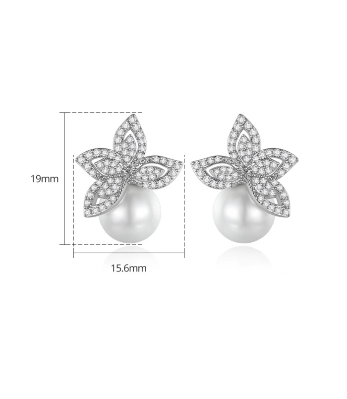 Silver Zircon Pearl Earrings angled close-up view resting on a dark surface