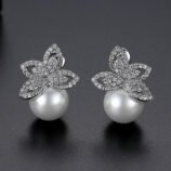 Silver Zircon Pearl Earrings with one piece laid down to show side profile