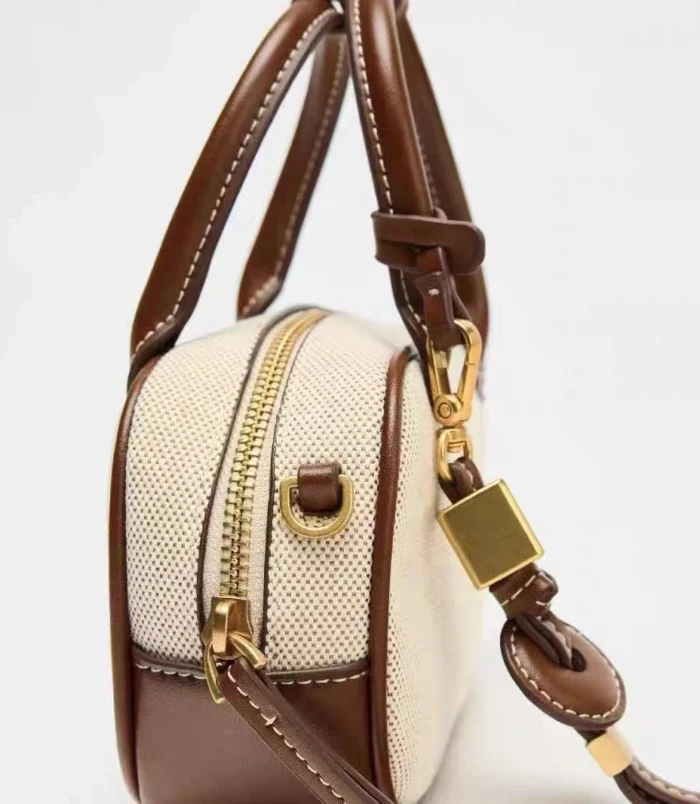 Solid PU Leather Small Square Bag close-up of the smooth gold zipper and hardware details.
