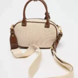 Solid PU Leather Small Square Bag featuring an alternative wide woven shoulder strap.