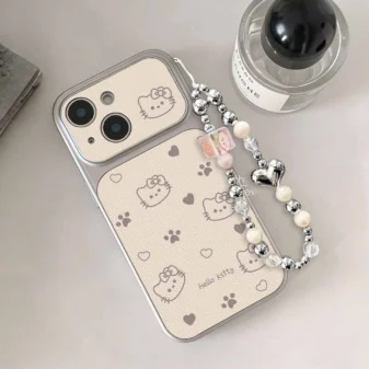 White Lambskin Hello Kitty Mirror Phone Case with beaded wrist strap attached.