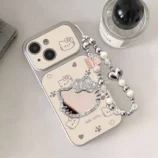 White Lambskin Hello Kitty Mirror Phone Case flat lay with all accessories.