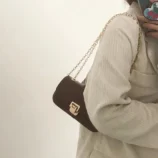 Classic PU Leather Underarm Bag for Women tucked elegantly under the arm