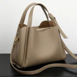Classic Soft PU Leather Tote Bag for Women khaki colour side angle highlighting the strap attachment.