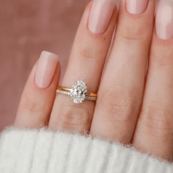 gold-double-layer-zircon-ring-2 Gold double layer zircon ring worn on a woman's hand.