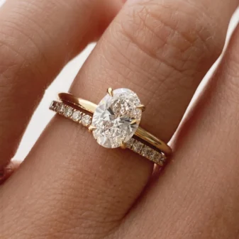 Beautiful gold double layer zircon ring worn on a finger.