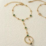 Gold-Plated Stainless Steel Heart Finger Bracelet close-up view of the green gemstone chain