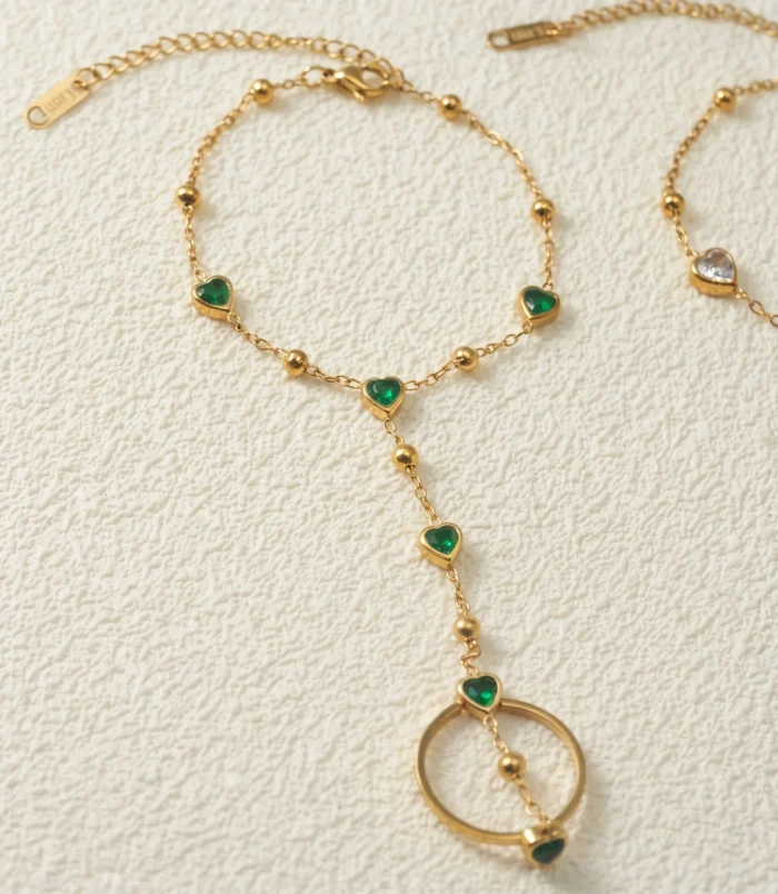 Gold-Plated Stainless Steel Heart Finger Bracelet close-up view of the green gemstone chain