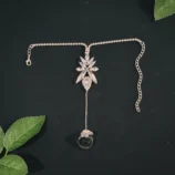 Gold & Silver Rhinestone Leaf Finger Bracelet silver flat lay view showing chain.