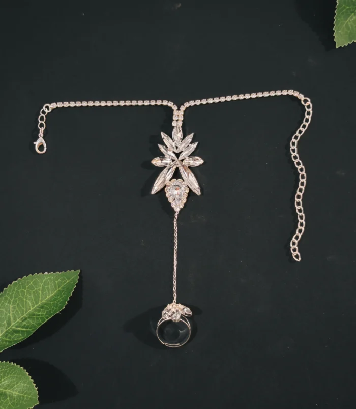 Gold & Silver Rhinestone Leaf Finger Bracelet silver flat lay view showing chain.