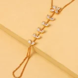 Gold & Silver Zircon Leaf Finger Bracelet for Women close-up view of the sparkling stones and links.