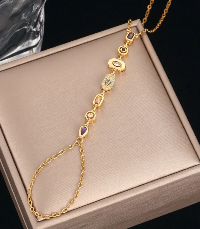 Golden colored diamond variant of the finger bracelet on a beige background