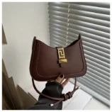 Minimalist PU Leather Baguette Bag for Women dark brown held by hand.