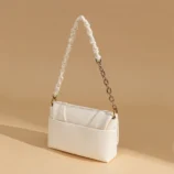 Multi-Colour Leather Underarm Bag for Women angled view showing the ruched strap and front flap.