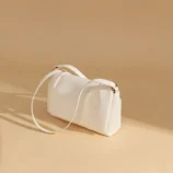 Multi-Colour Leather Underarm Bag for Women displaying the smooth back and bottom structure.