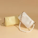 Multi-Colour Leather Underarm Bag for Women displaying the yellow and white colour variations together.