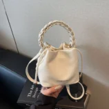 Multi-Colour Woven Handle Bucket Bag for Women in off-white displayed in a close-up view