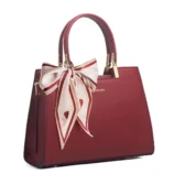Multicolor PU leather Boston bag in rich burgundy color with gold hardware.