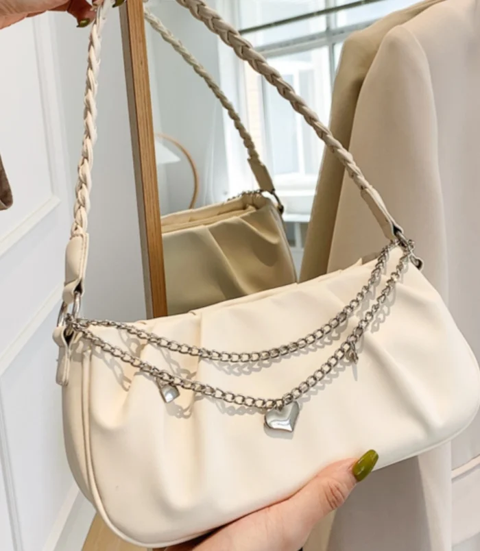 Pleated Chain Shoulder Bag for Women held by hand showing front details.