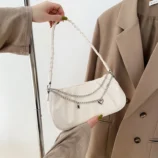Pleated Chain Shoulder Bag for Women highlighting the braided strap design.