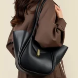 Classic PU Leather Bucket Bag for Women worn on shoulder