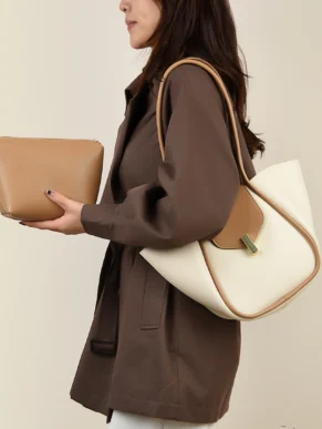 Classic PU Leather Bucket Bag for Women in two-tone apricot worn by model