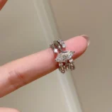 Silver Minimalist Stackable Zircon Ring styled gracefully on index finger