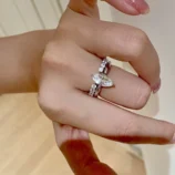 Silver Minimalist Stackable Zircon Ring close-up worn on middle finger