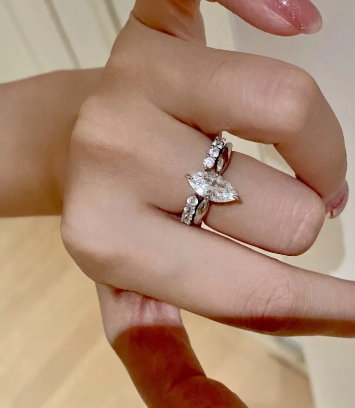 Silver Minimalist Stackable Zircon Ring close-up worn on middle finger