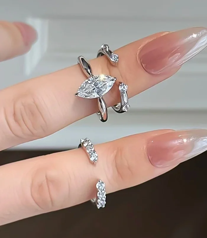 Silver Minimalist Stackable Zircon Ring separated and styled on two fingers