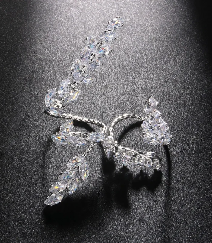 Silver Zircon Leaf Open Ring for Women top view resting on a surface