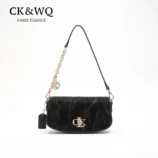 Textured PU shoulder bag for women showing front view of the black variation
